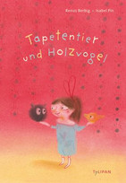 Tapetentier und Holzvogel